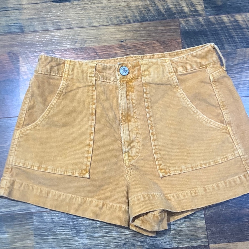 Mustard Yellow Corduroy American Eagle shorts.